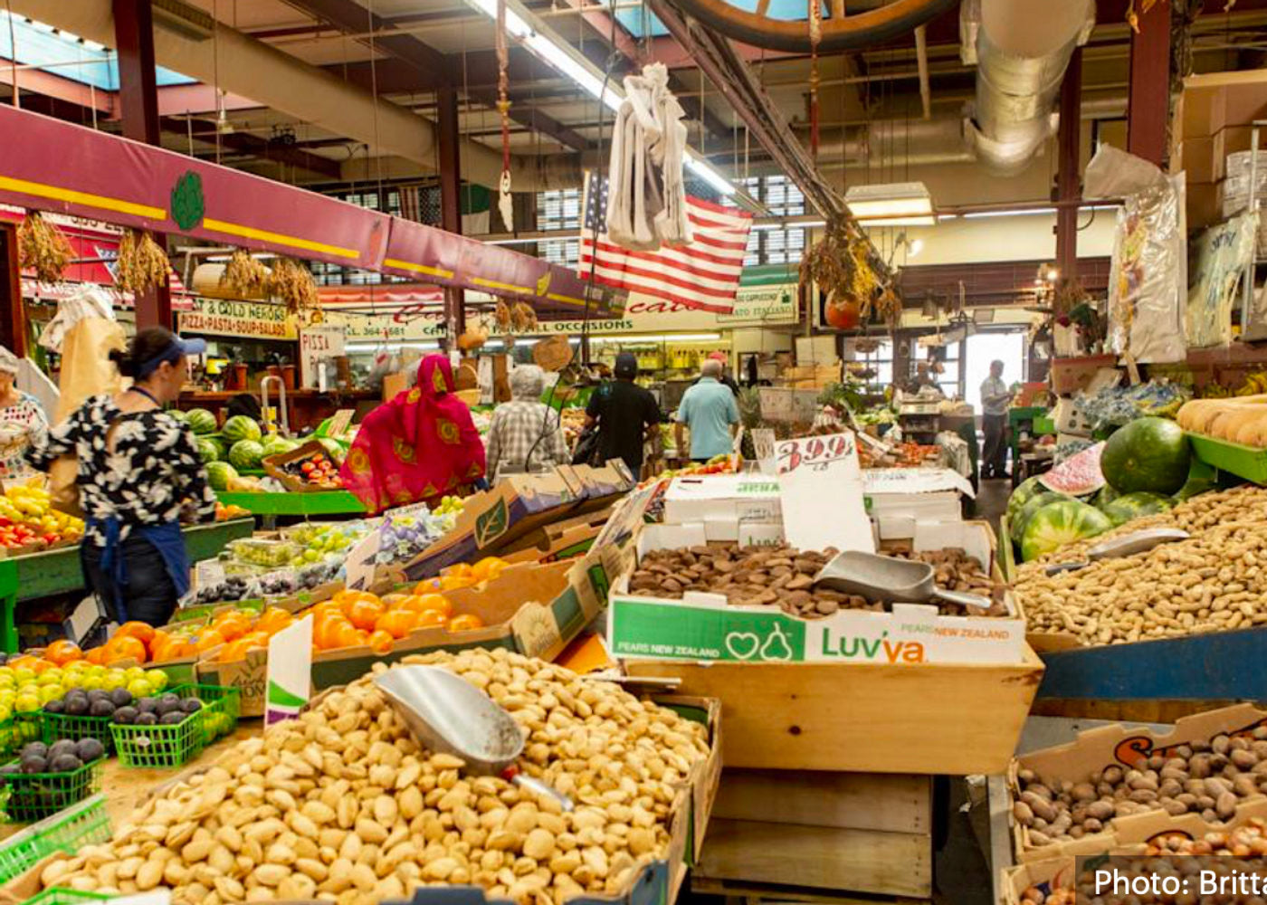 Produce stand inside the Arthur Avenue Retail Market